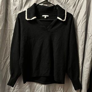 Elegant Black V-Neck Sweater with White Trim